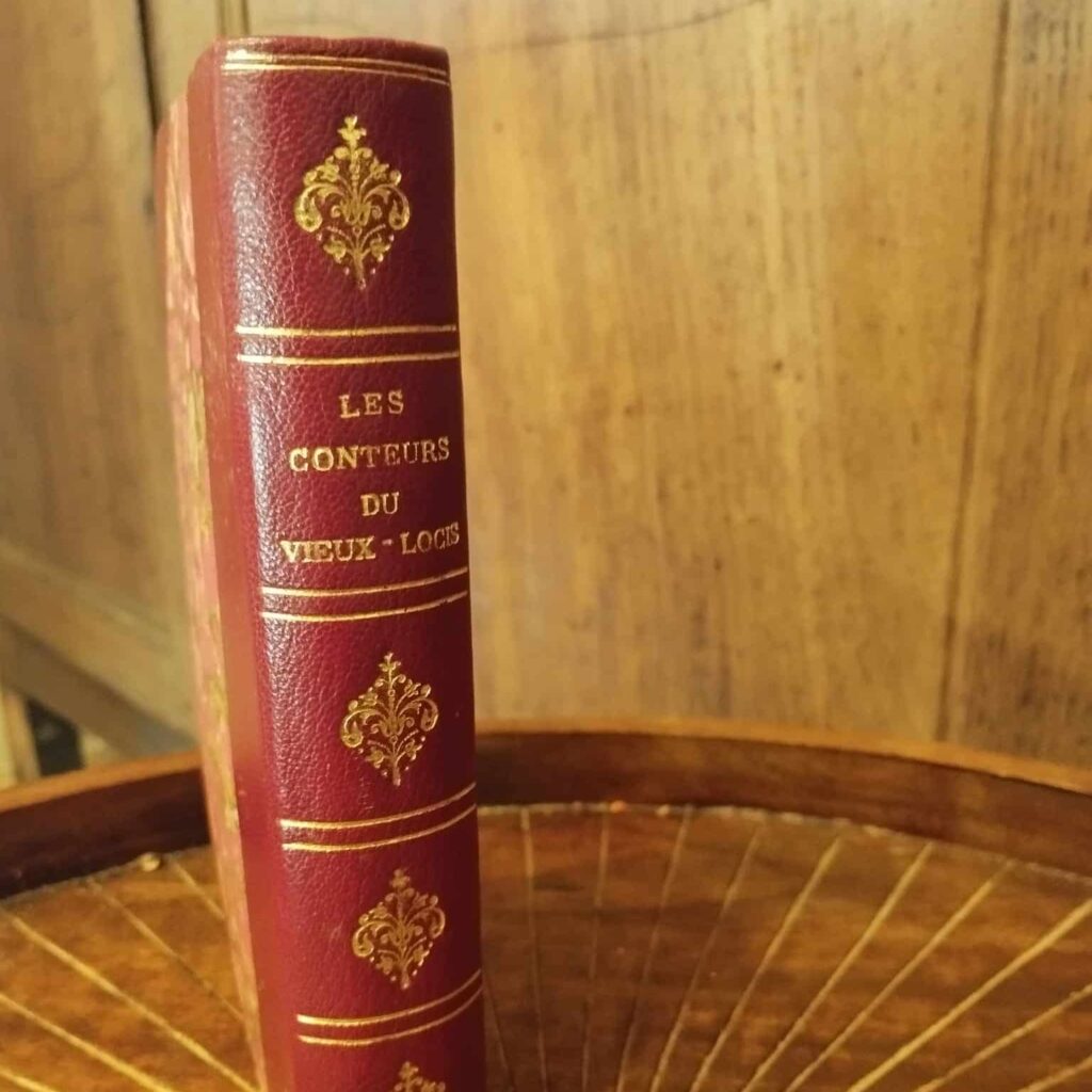 Titrage et dorure sur dos d'un livre